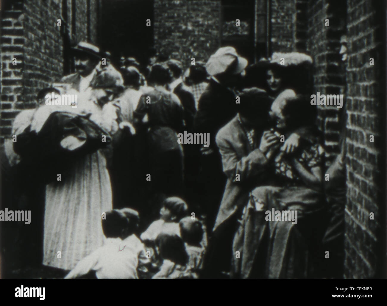 Still from D.W. Griffith's The Musketeers of Pig Alley (1912) released by Biograph. Stock Photo