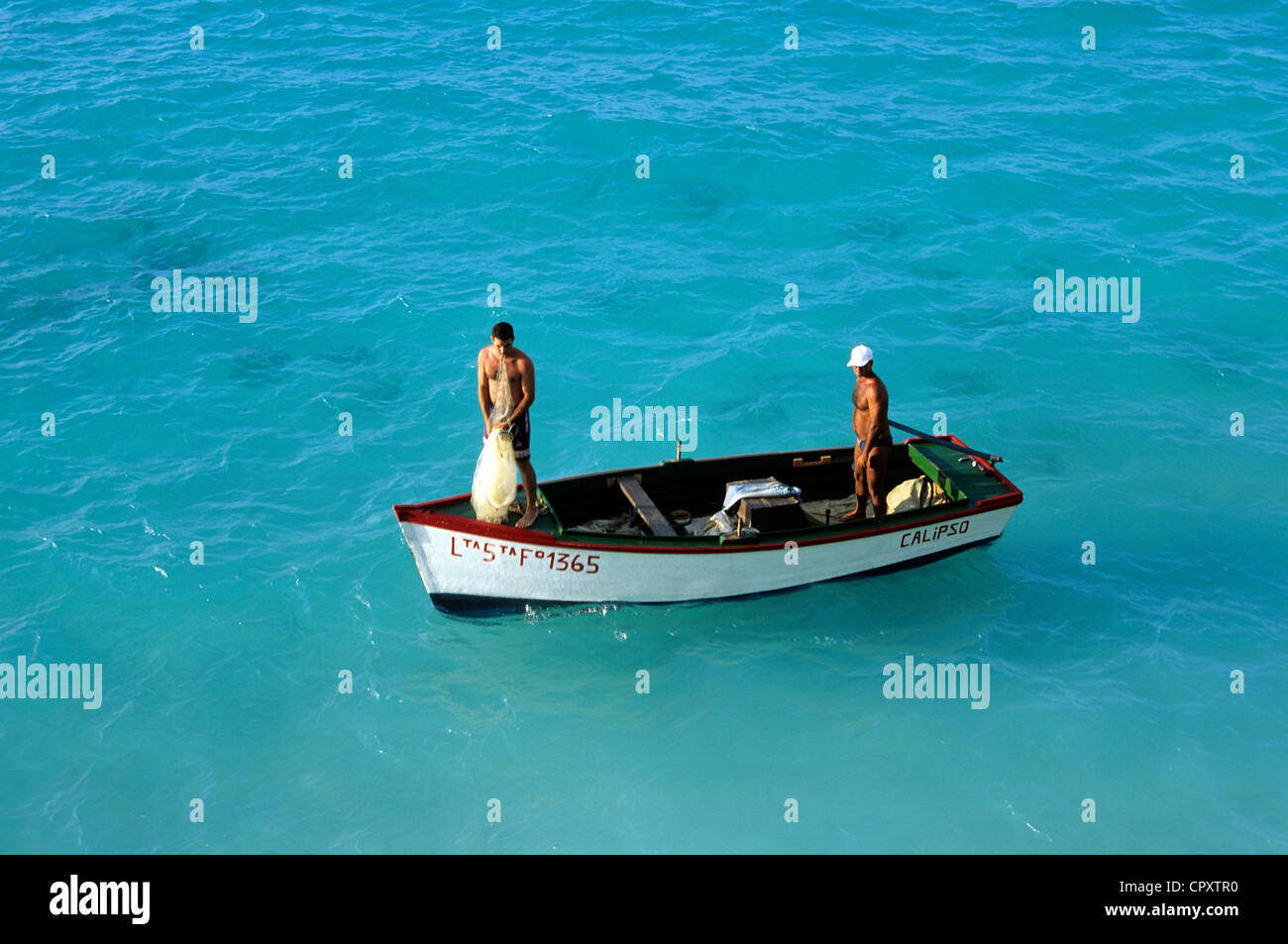 Cuba, Matanzas Province, Varadero, fisherman on a small boat Stock Photo