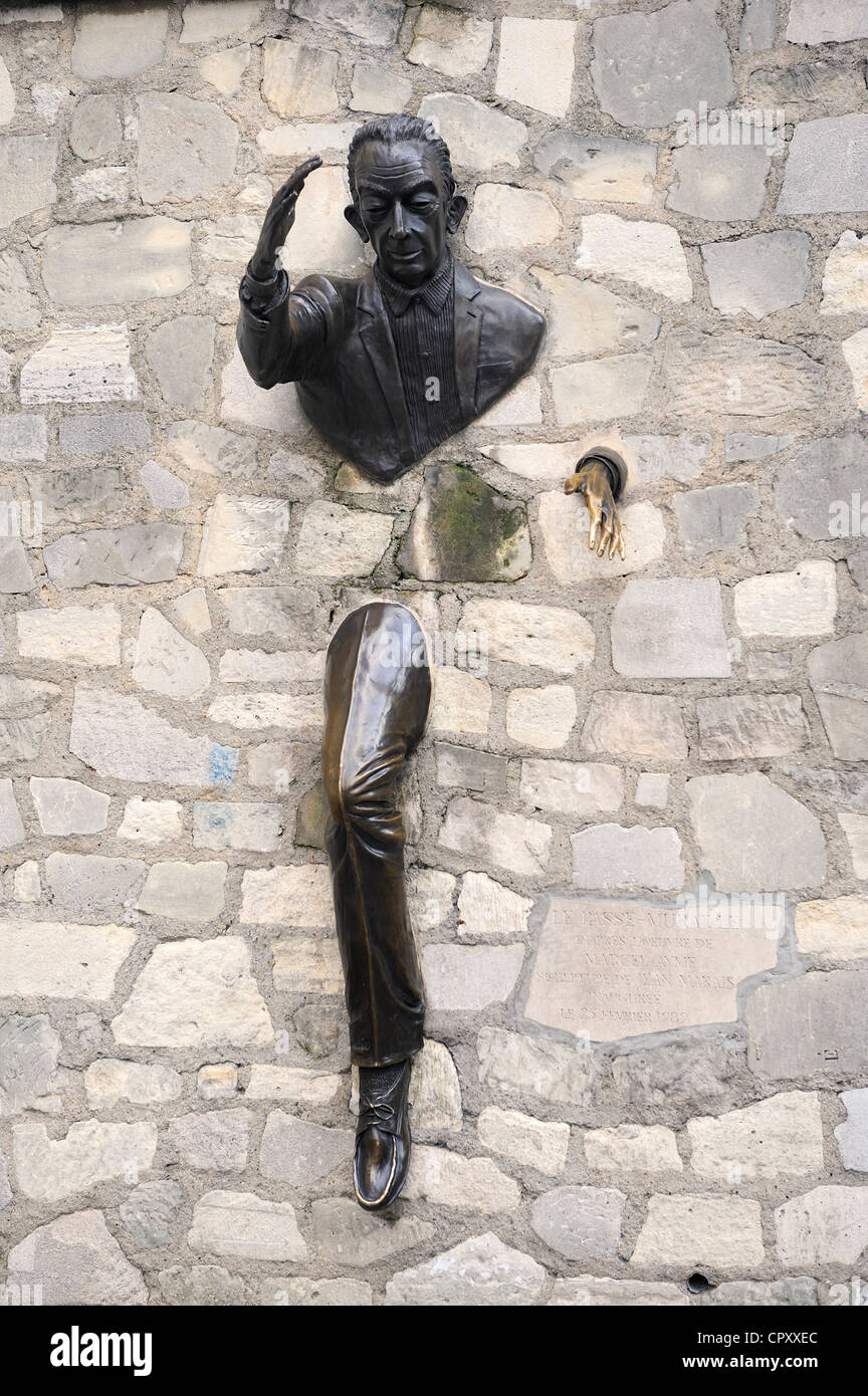 France, Paris, Montmartre, Place Marcel Ayme, Le Passe Muraille by Jean Marais Stock Photo