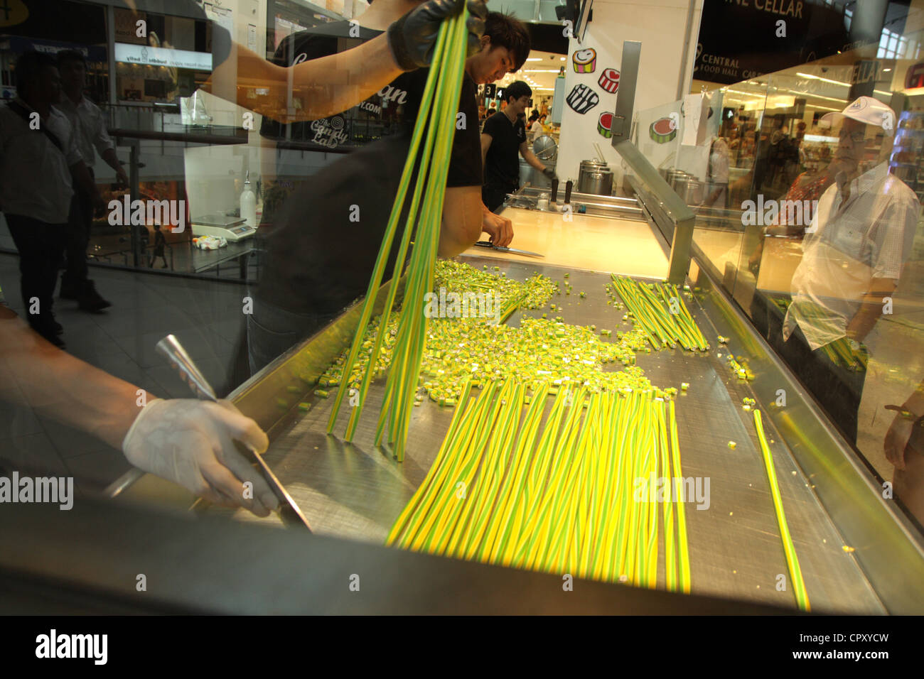 Candy maker making handmade candy , Made in candy shop in Bangkok Stock