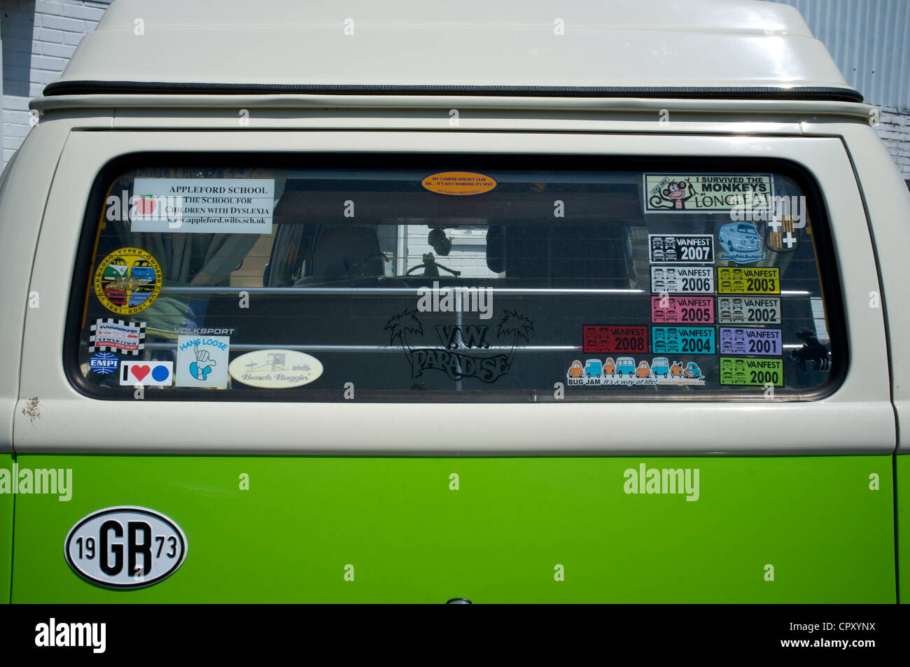 Stickers in the rear window of a 1973 Volkswagon camper van Stock Photo