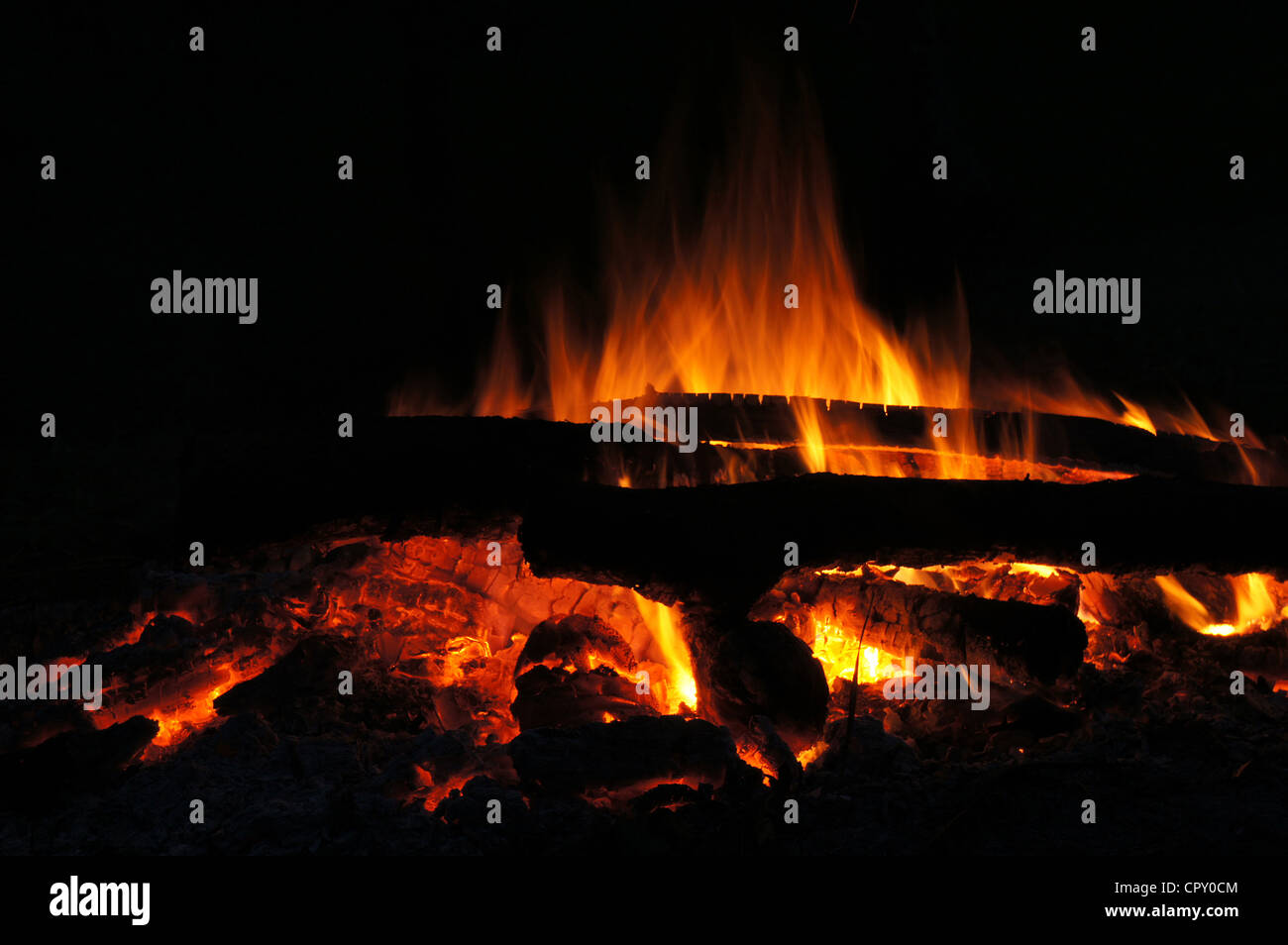 Bright red yellow fire flames in dark night Stock Photo - Alamy