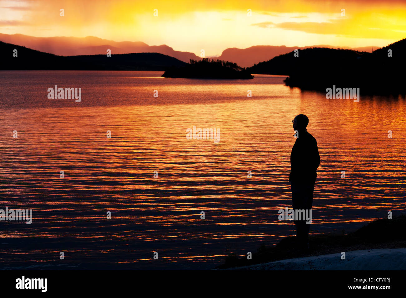 mountains lake at sunset in Norway Stock Photo