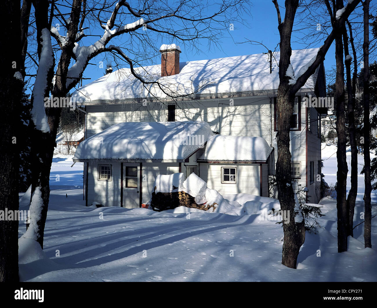 Canada, snowy white wood cottage Stock Photo