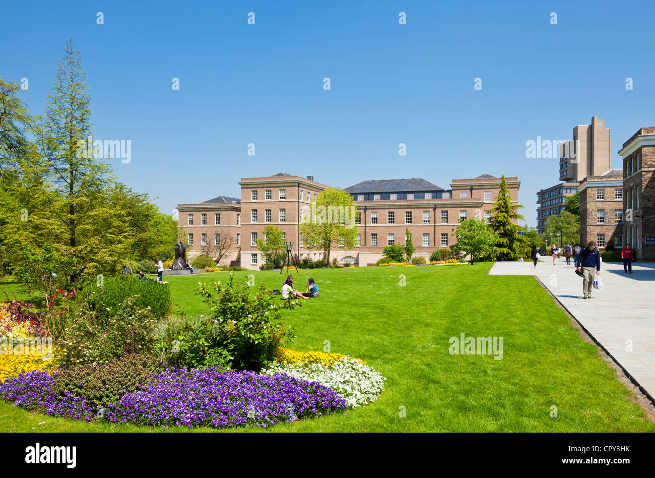 University of Leicester campus buildings students on grass Leicestershire East Midlands England UK GB EU Europe Stock Photo