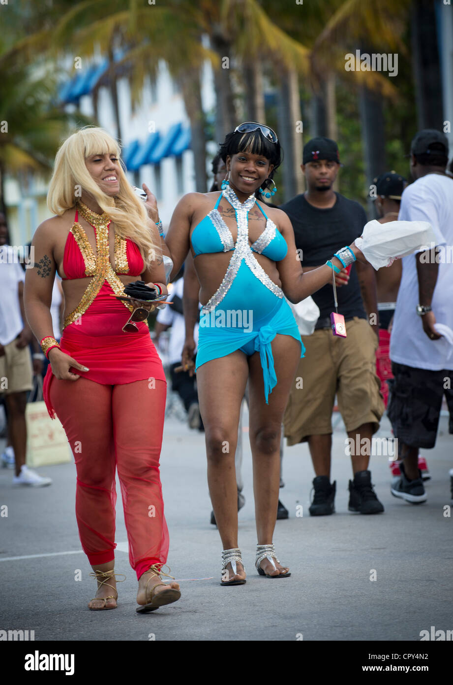 MIAMI - May 26, 2012: Happy girls during the Miami Beach Urban Weekend, this is the largest Urban Festival in the World, that caters towards the Hip Hop Generation. Over 300.000 participants make the annual trek to South Beach for 4 days full of fun, food, festivities, entertainment, music, and more. Stock Photo