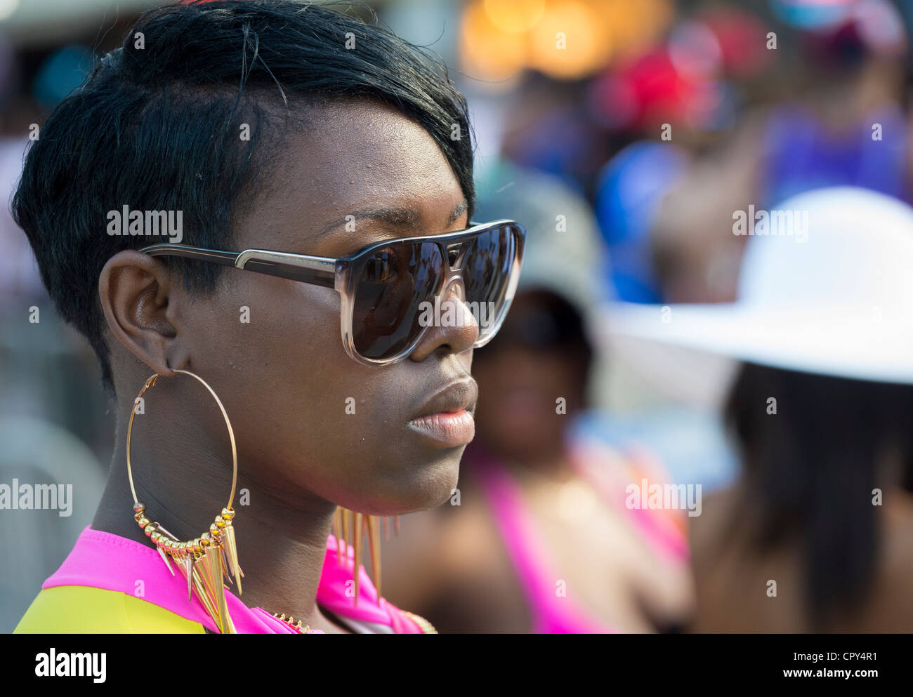 MIAMI - May 26, 2012: Portrait of woman during the Miami Beach Urban Weekend, this is the largest Urban Festival in the World, that caters towards the Hip Hop Generation. Over 300.000 participants make the annual trek to South Beach for 4 days full of fun, food, festivities, entertainment, music, and more. Stock Photo
