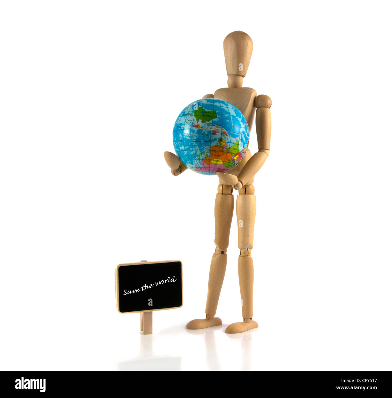 wooden puppet with a blackboard and the globe save the world Stock Photo