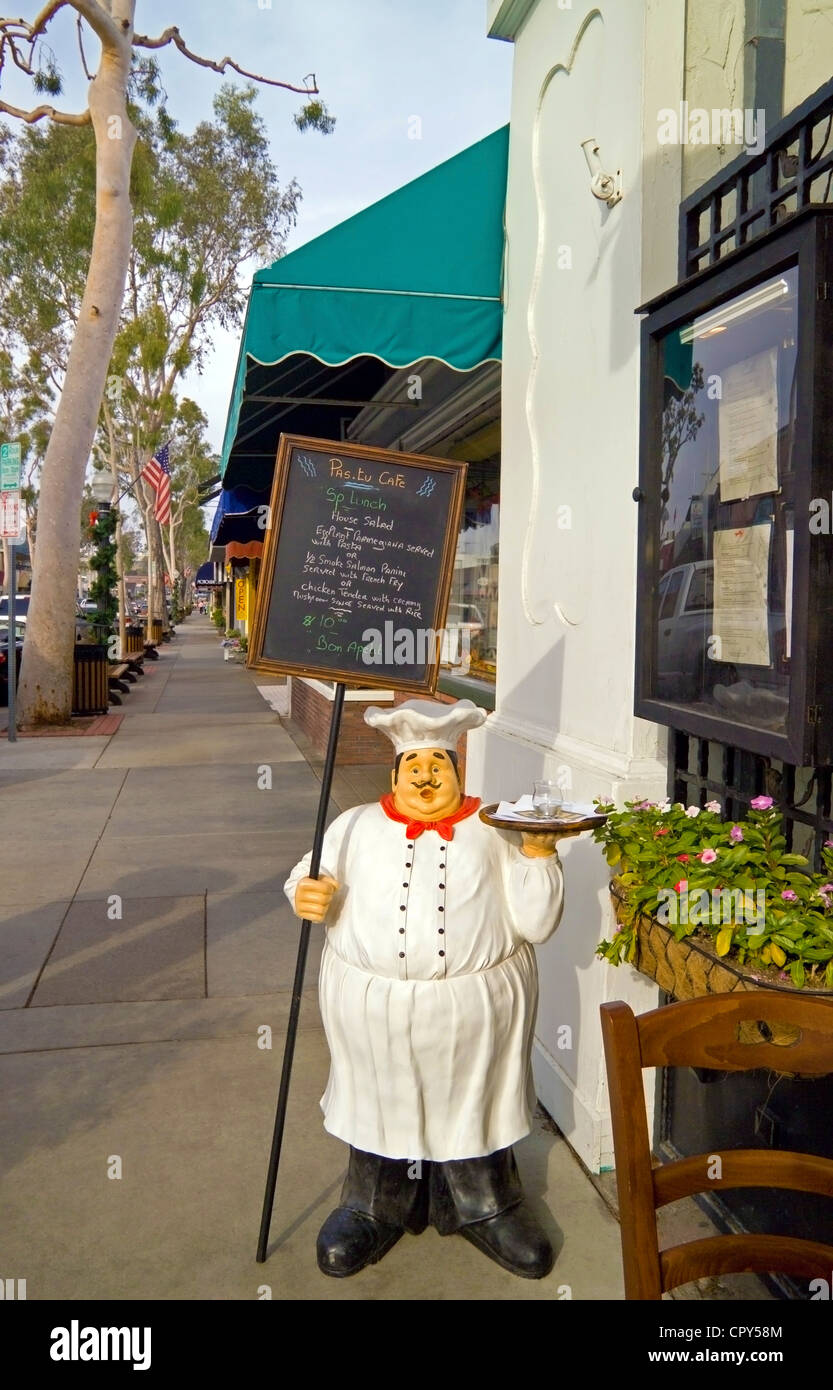 Restaurants and stores line Marine Avenue, the main shopping street that is only two blocks long on quaint Balboa Island in Newport Beach, California. Stock Photo
