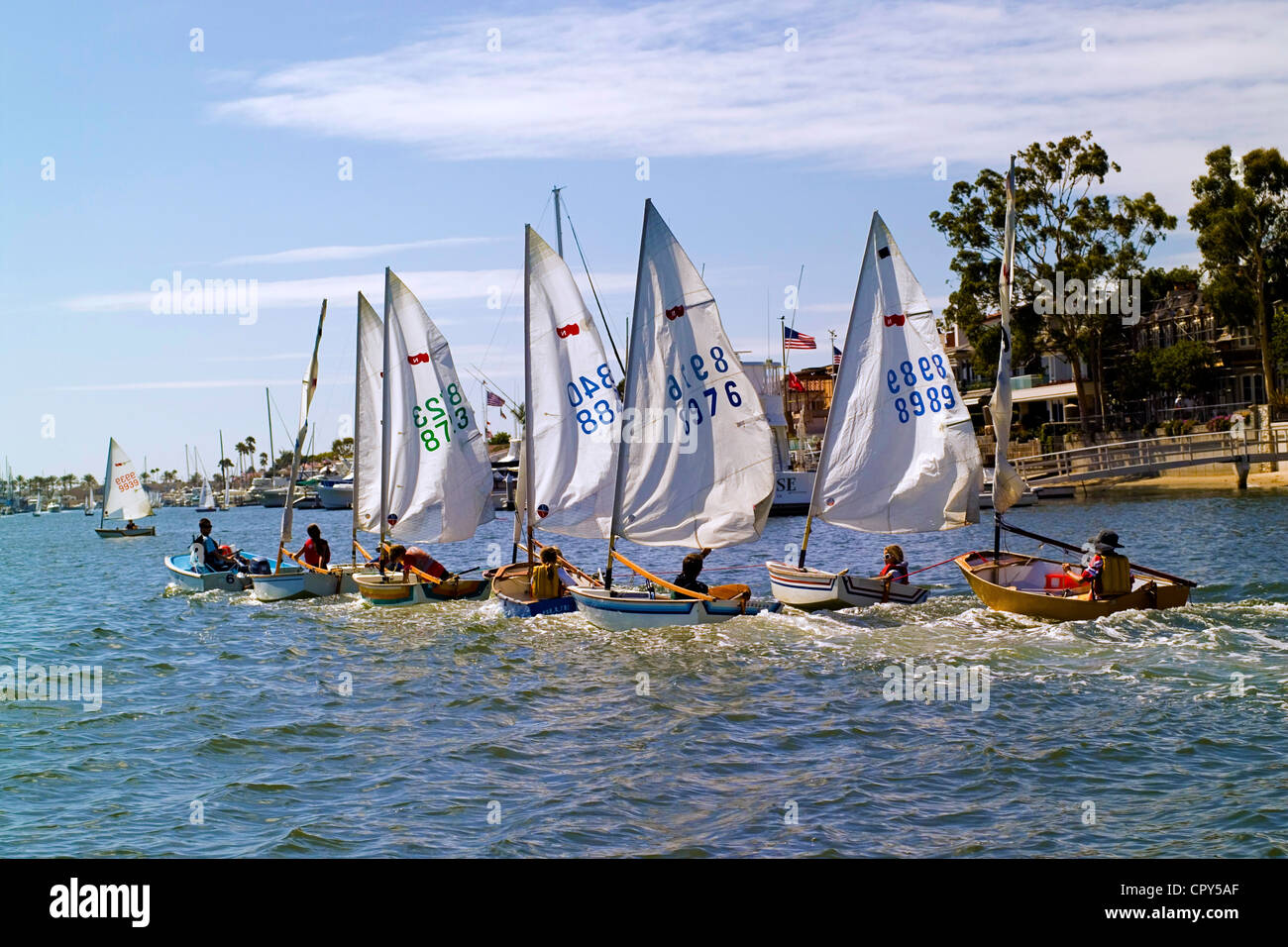 Children who learn about sailing in one-person dinghy sailboats called  Sabots are a frequent sight in Newport Harbor at Newport Beach, California,  USA Stock Photo - Alamy