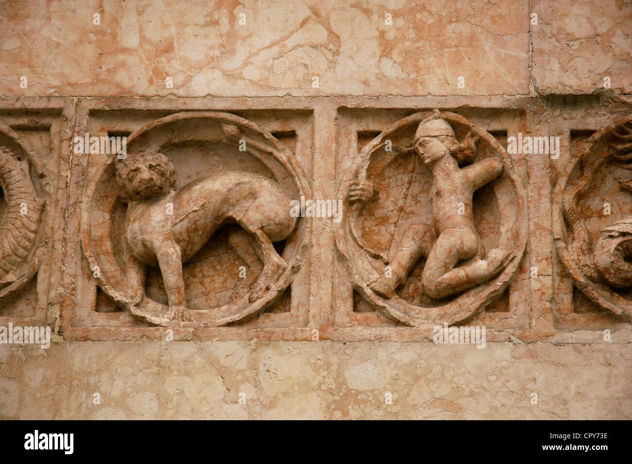 Italy. Parma. Baptistery (1196-1260). Reliefs of different zodiacal signs and animals by Benedetto Antelami. Stock Photo