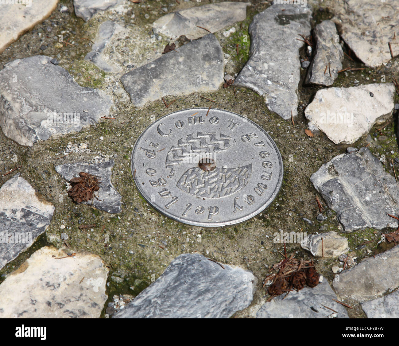 A plaque set in the walkway of the Greenway walk around lake Como, Italian Lakes, Lombardy, Italy Stock Photo