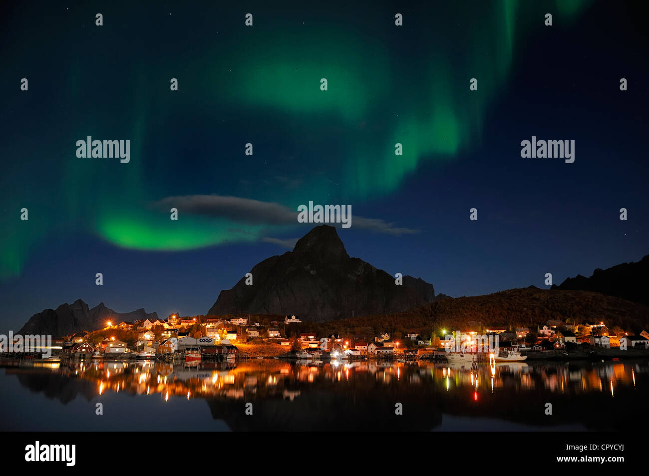 Norway, Nordland County, Lofoten Islands, Moskenes Island, aurora borealis over Reine fishermen village Stock Photo