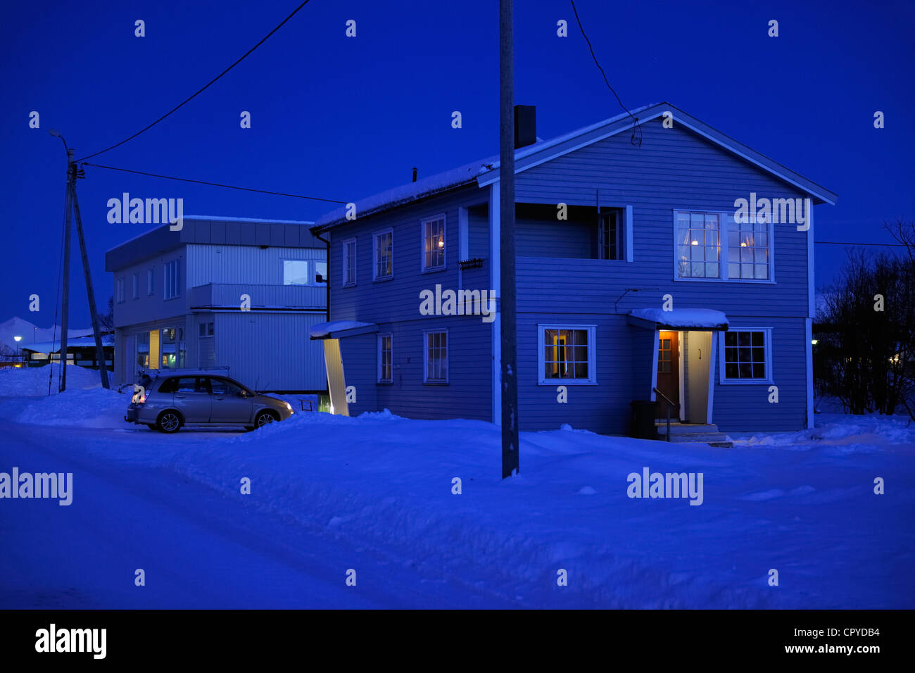 Norway, Nordland County, Vesteralen Islands, Myre, wooden house at dusk ...