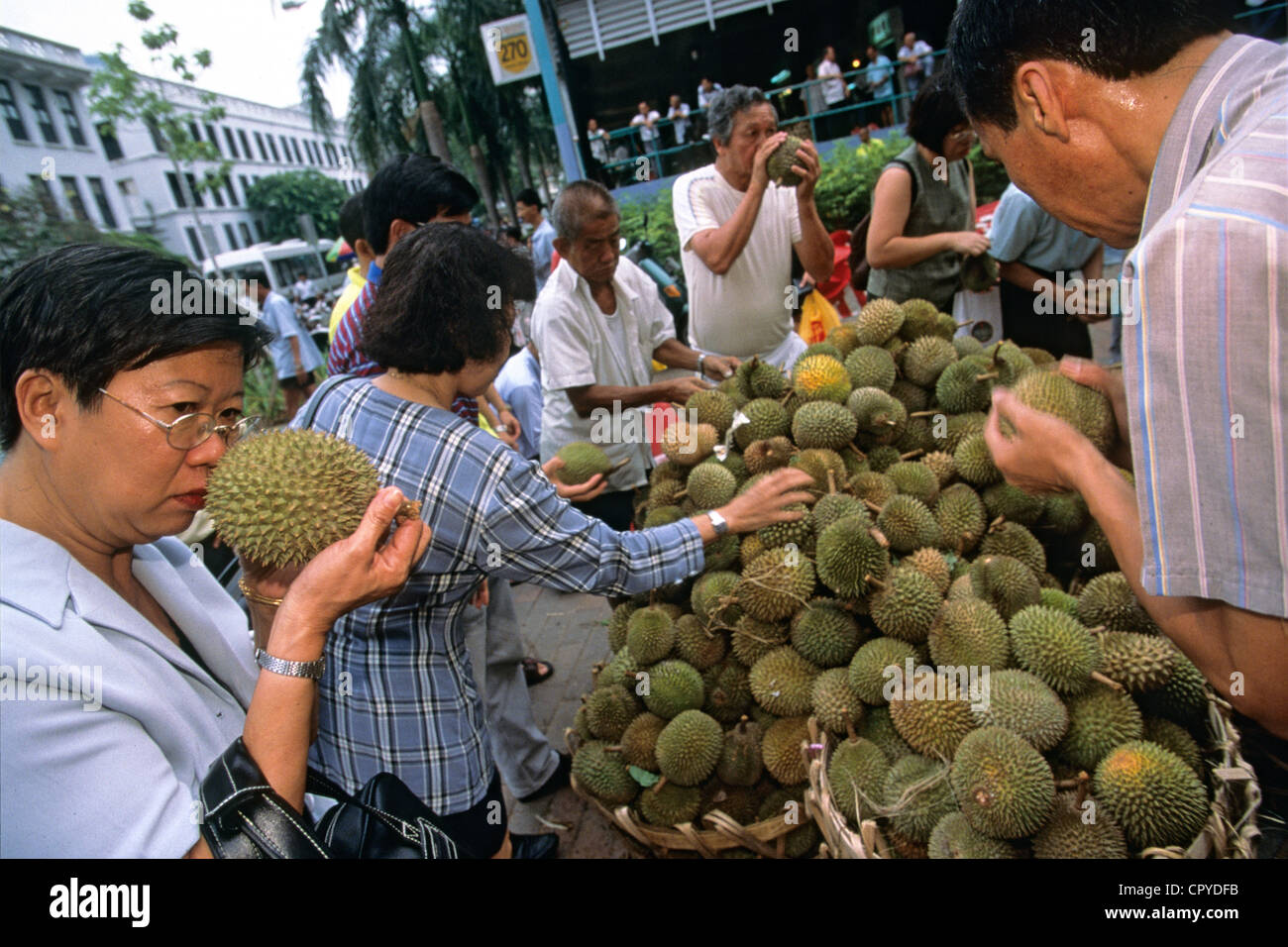 Singapore, Bugis market, pile of durians on the stall in the street Stock Photo