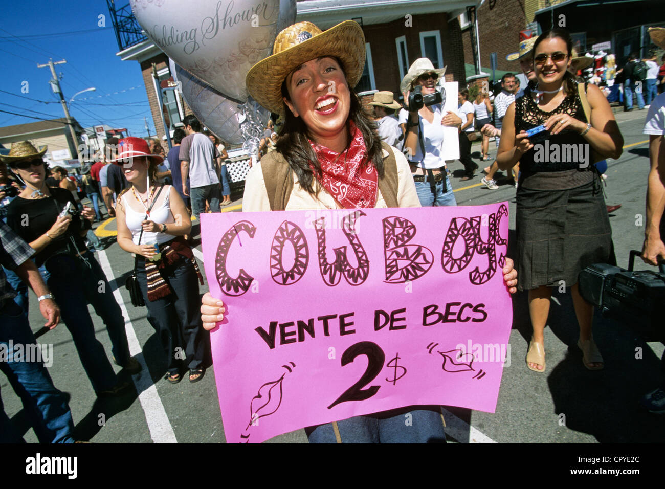Canada, Quebec Province, Saint Tite, Western Festival, young woman selling  'becs' (kisses Stock Photo - Alamy