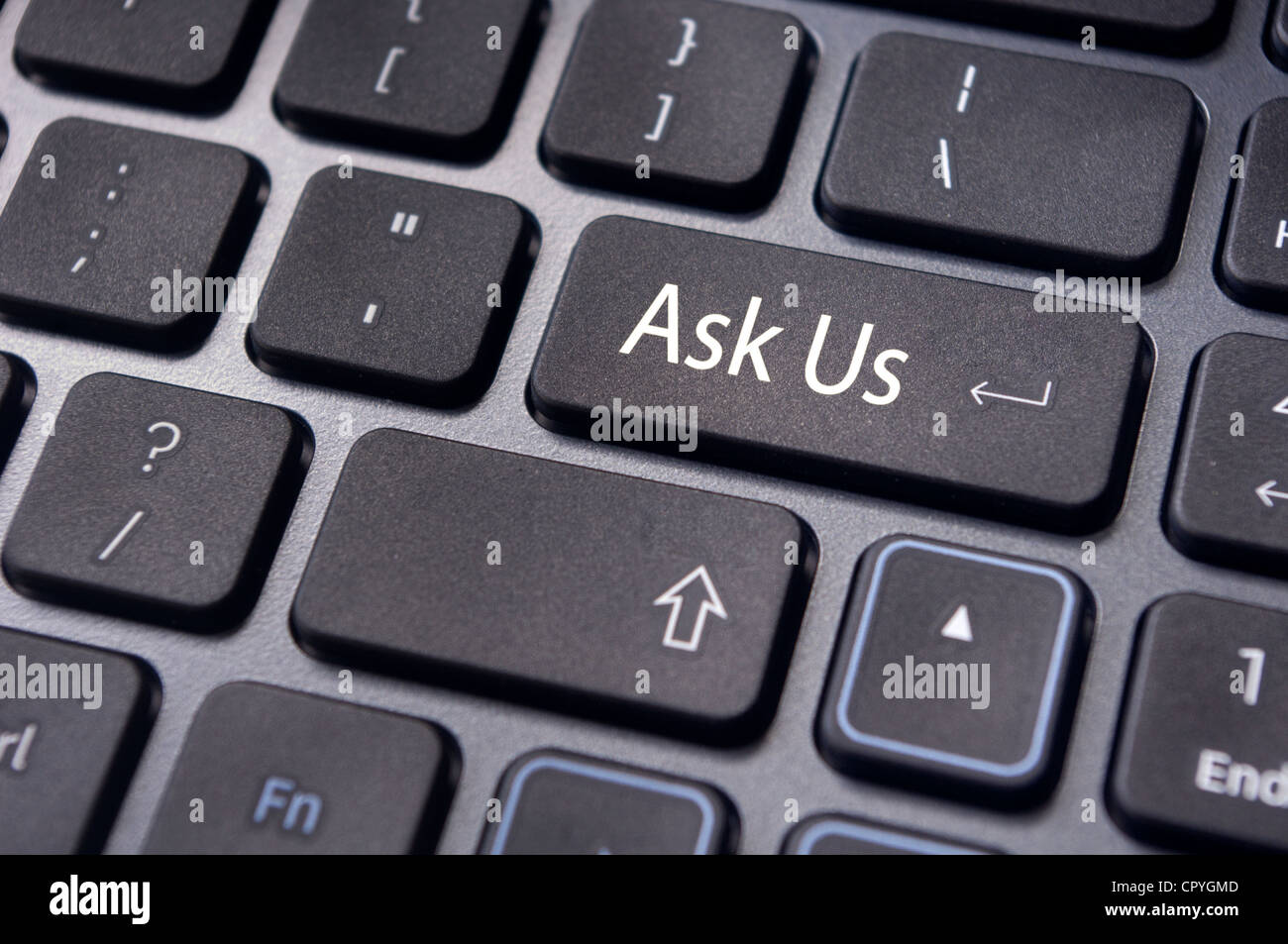 a message on keyboard enter key for 'ask us' concepts. Stock Photo