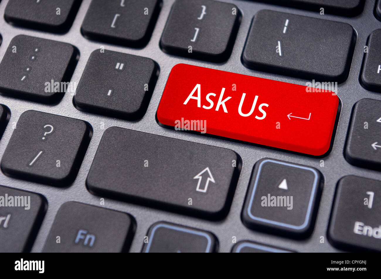 a message on keyboard enter key for 'ask us' concepts. Stock Photo