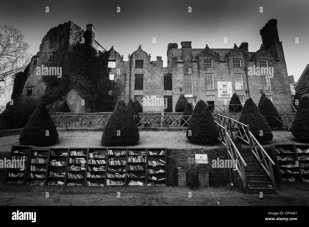 Hay-on-Wye - the old castle bookstore with display of free paperbacks. In winter. Stock Photo