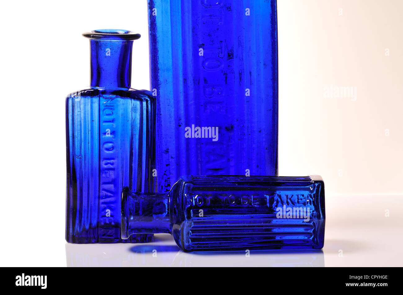 Blue poison bottles Stock Photo Alamy