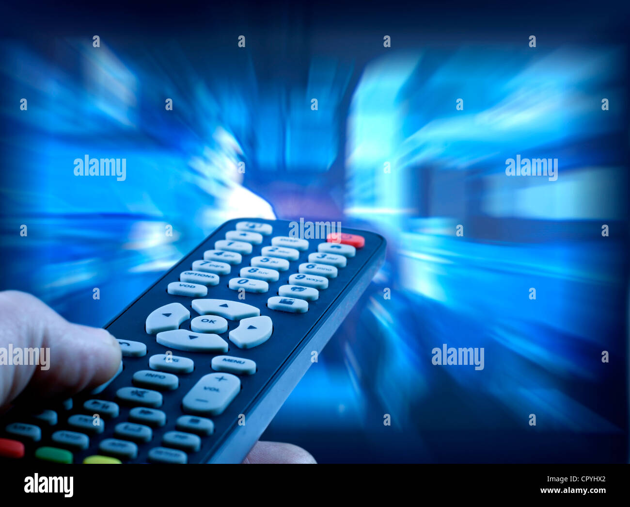 Watching tv with remote control background television Stock Photo