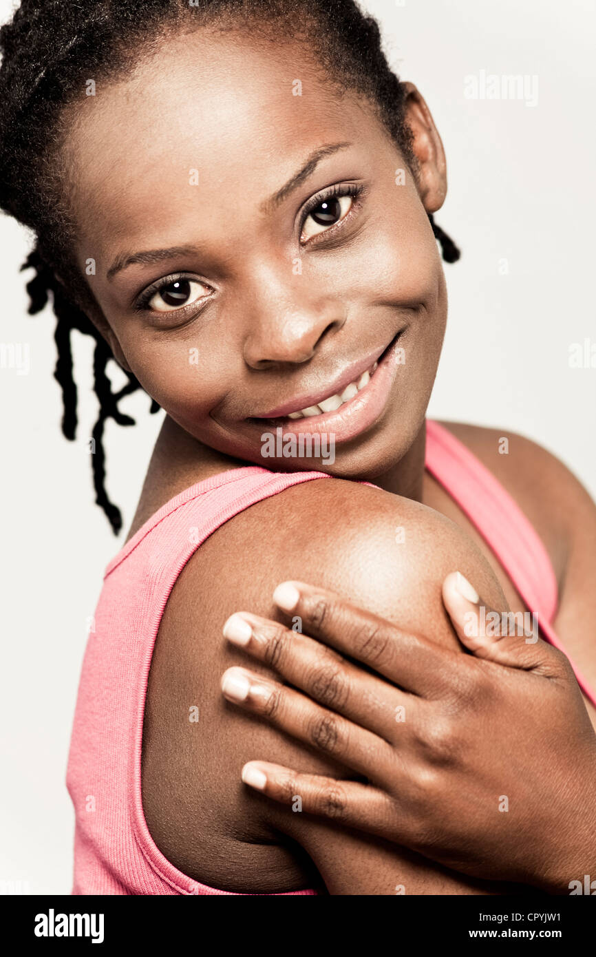 Head and shoulders portrait of young black woman Stock Photo - Alamy