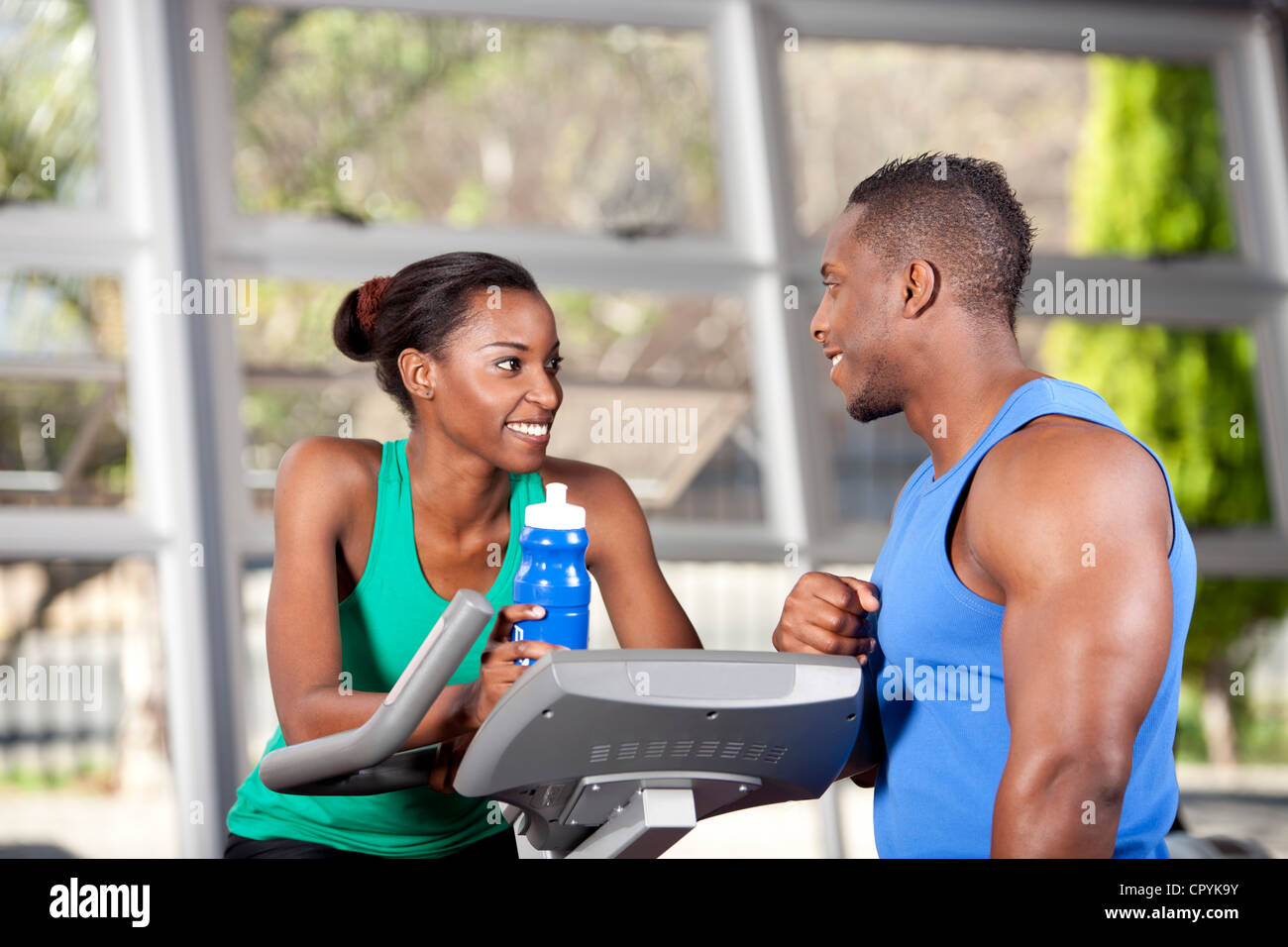 Two young black friends in a gym, chatting Stock Photo