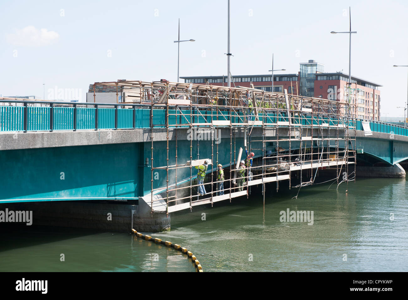 The Queen Elizabeth ll Bridge which spans the River Lagan being refurbished Stock Photo