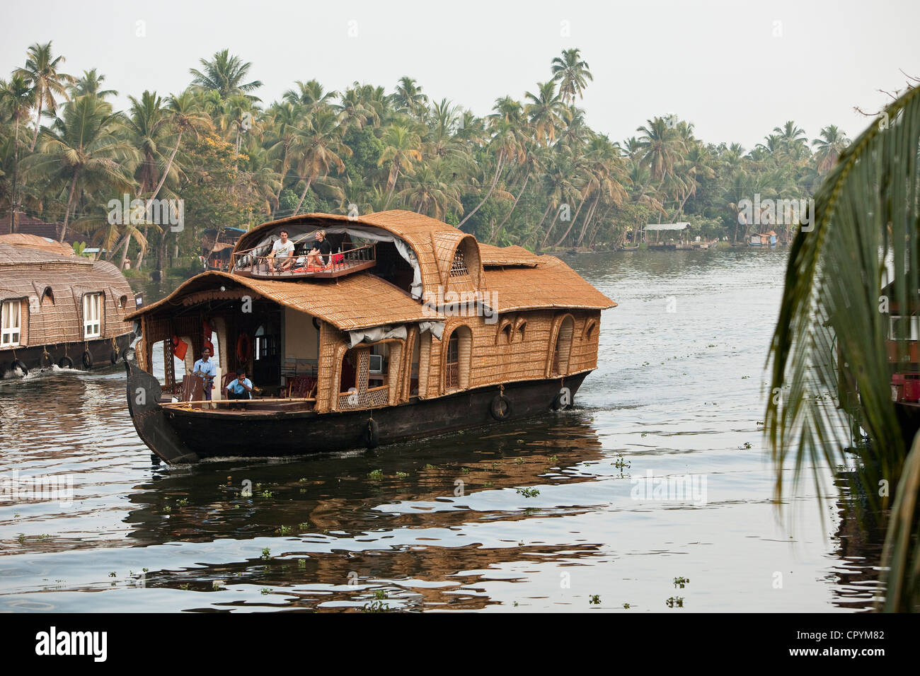 India Kerala State Allepey the backwaters houseboats (old transport barge converted for the touristic cruising of the canals) Stock Photo