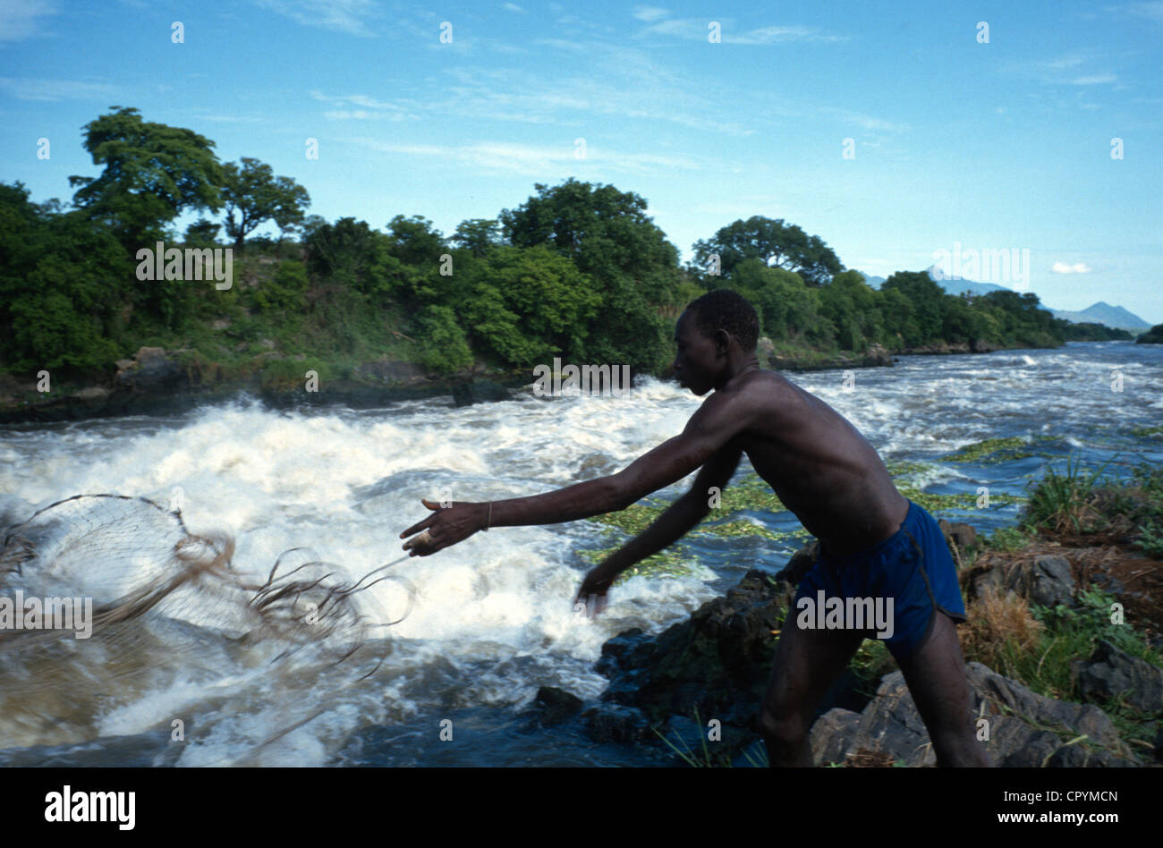 A man fishing on the river Nile at the south sudan ugandan border Stock ...