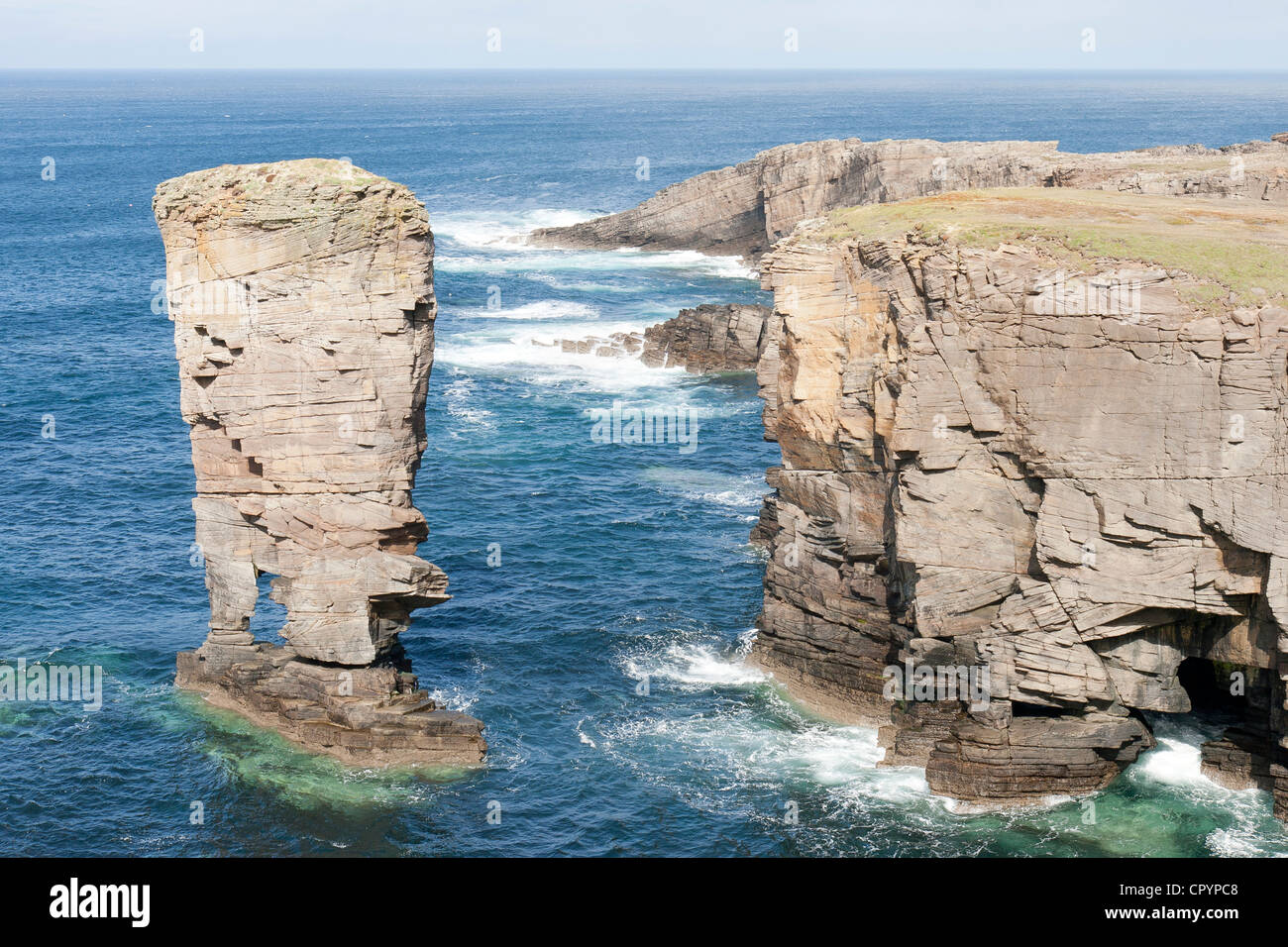 Yesnaby on the Orkney Islands a stack and blue sea Stock Photo