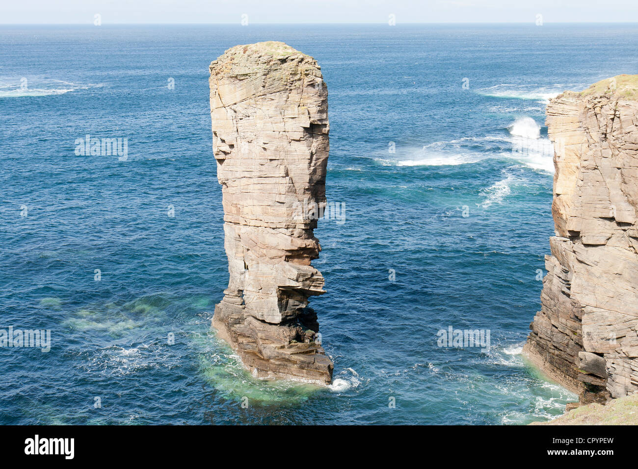 Yesnaby on the Orkney Islands a stack and blue sea Stock Photo