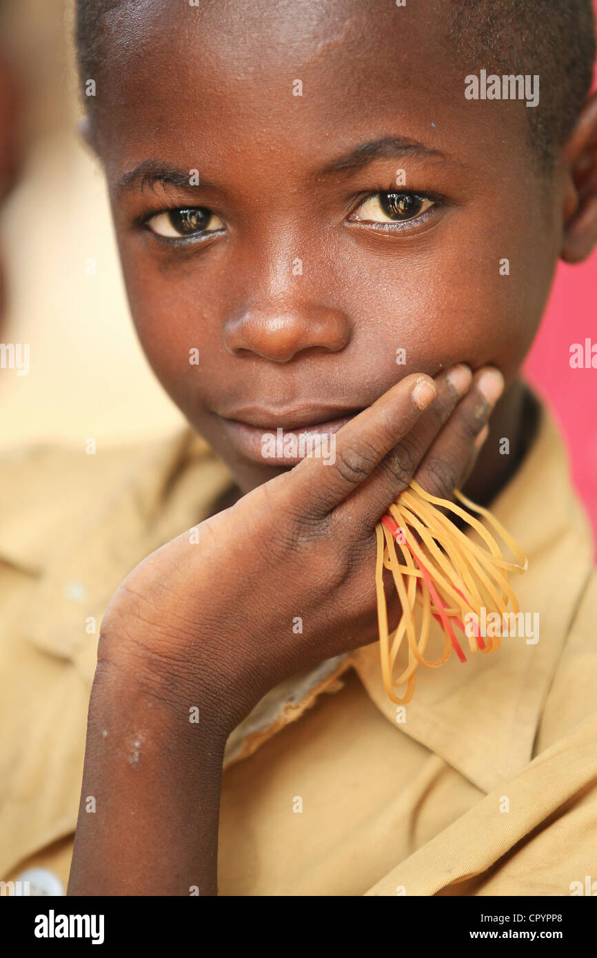 Boy holding elastic bands at an orphanage and school in N'Djamena, Chad on Thursday June 10, 2010. Stock Photo