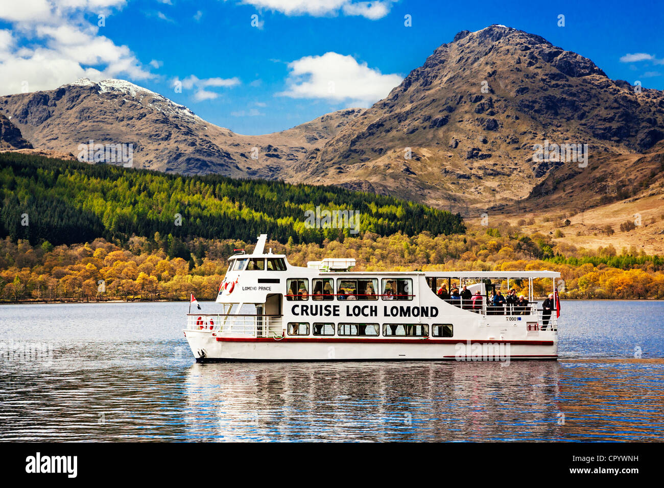 A cruise boat sailing on Loch Lomond, Scotland. Stock Photo