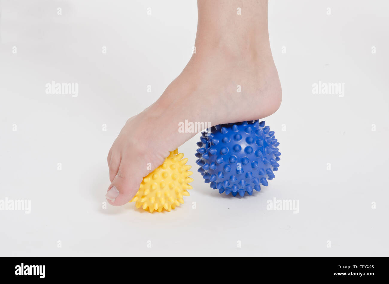 Ball under foot massage hires stock photography and images Alamy