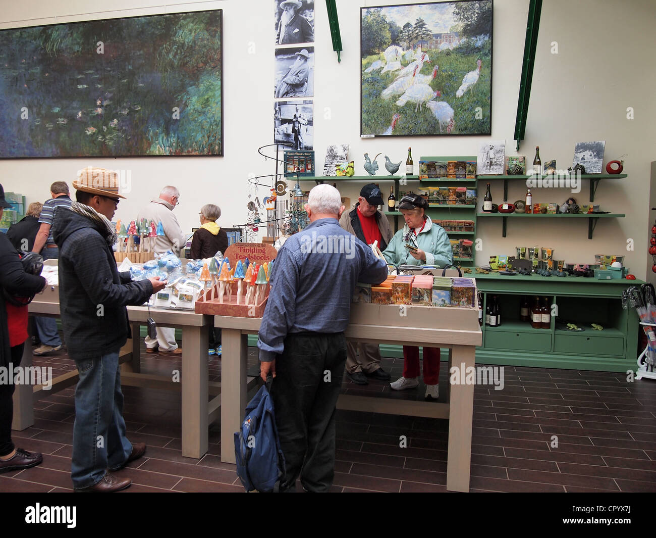 Tourists browsing in the gift shop at Claude House, Giverny