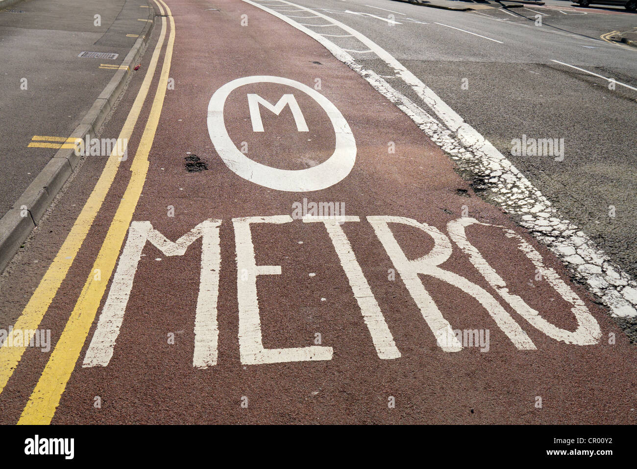 Metro sign in a road lane for the ftrmetro in Swansea, Stock Photo