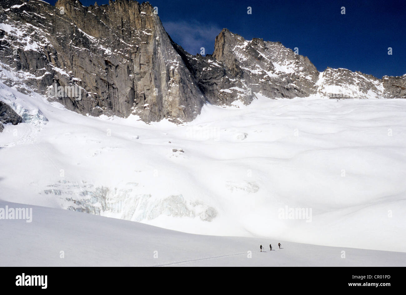 Switzerland, Graubunden, Bregaglia range, Ski touring going up Cima di Castello (3300m) Stock Photo