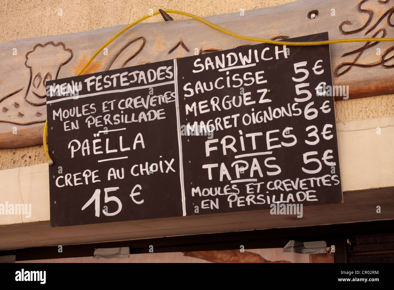 Festival menu above a restaurant in Gruissan Languedoc-Roussillon France Stock Photo
