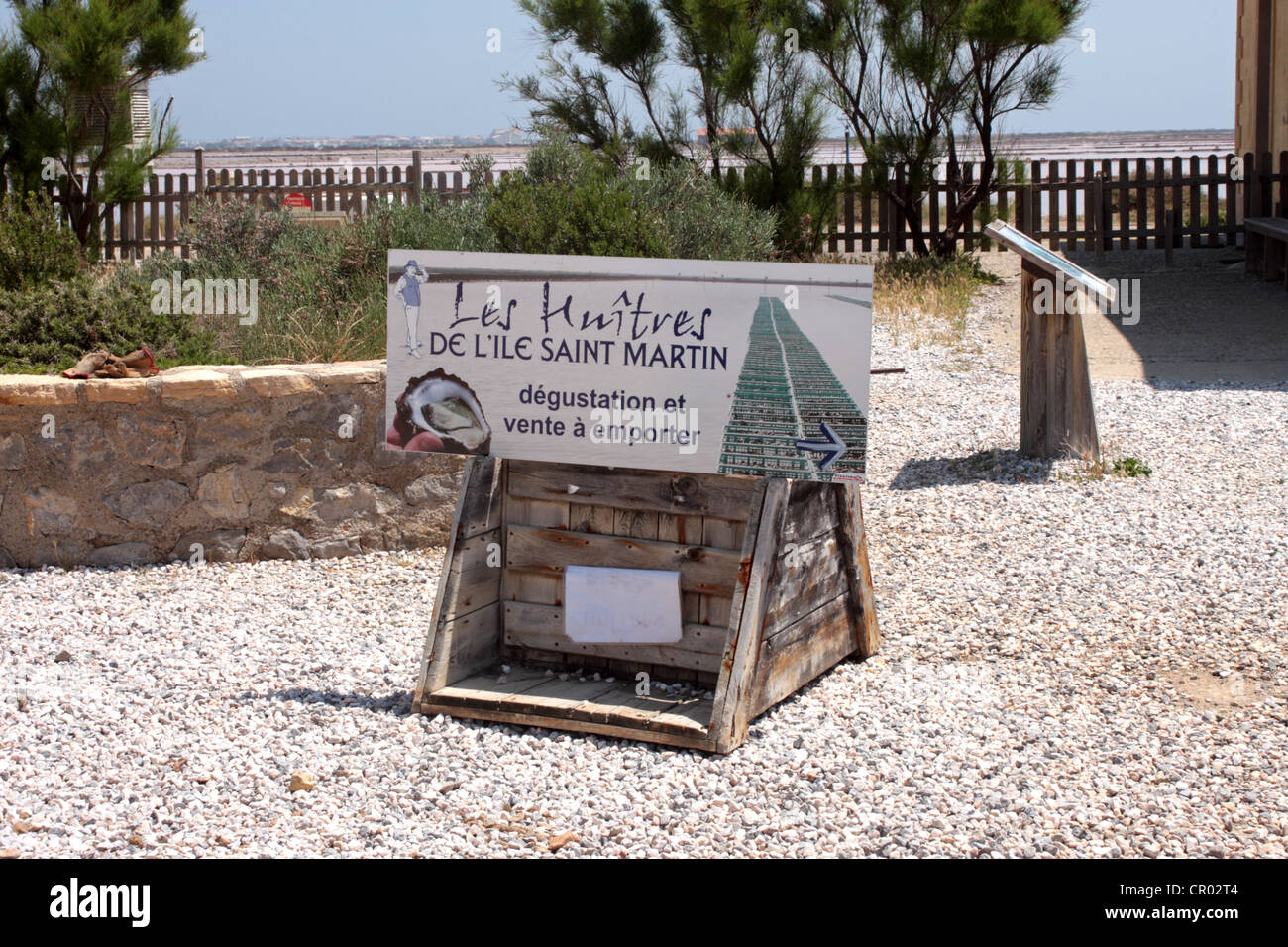 Sign advertising the Saint Martin oyster farm and restaurant Gruissan Languedoc-Roussillon France Stock Photo