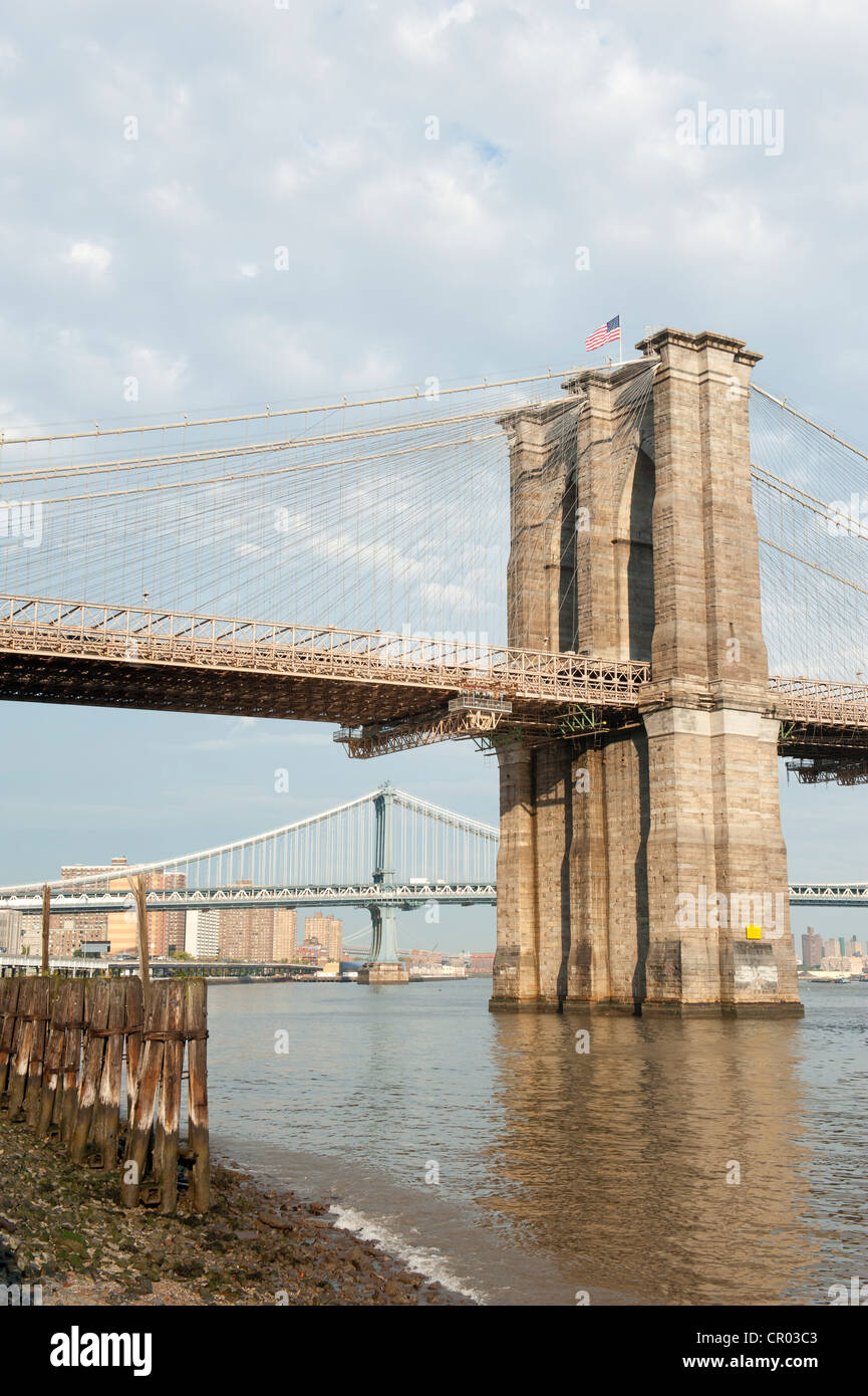 View from Manhattan towards the Brooklyn Bridge with the Manhattan Bridge the rear, suspension bridges, Two Bridges District Stock Photo
