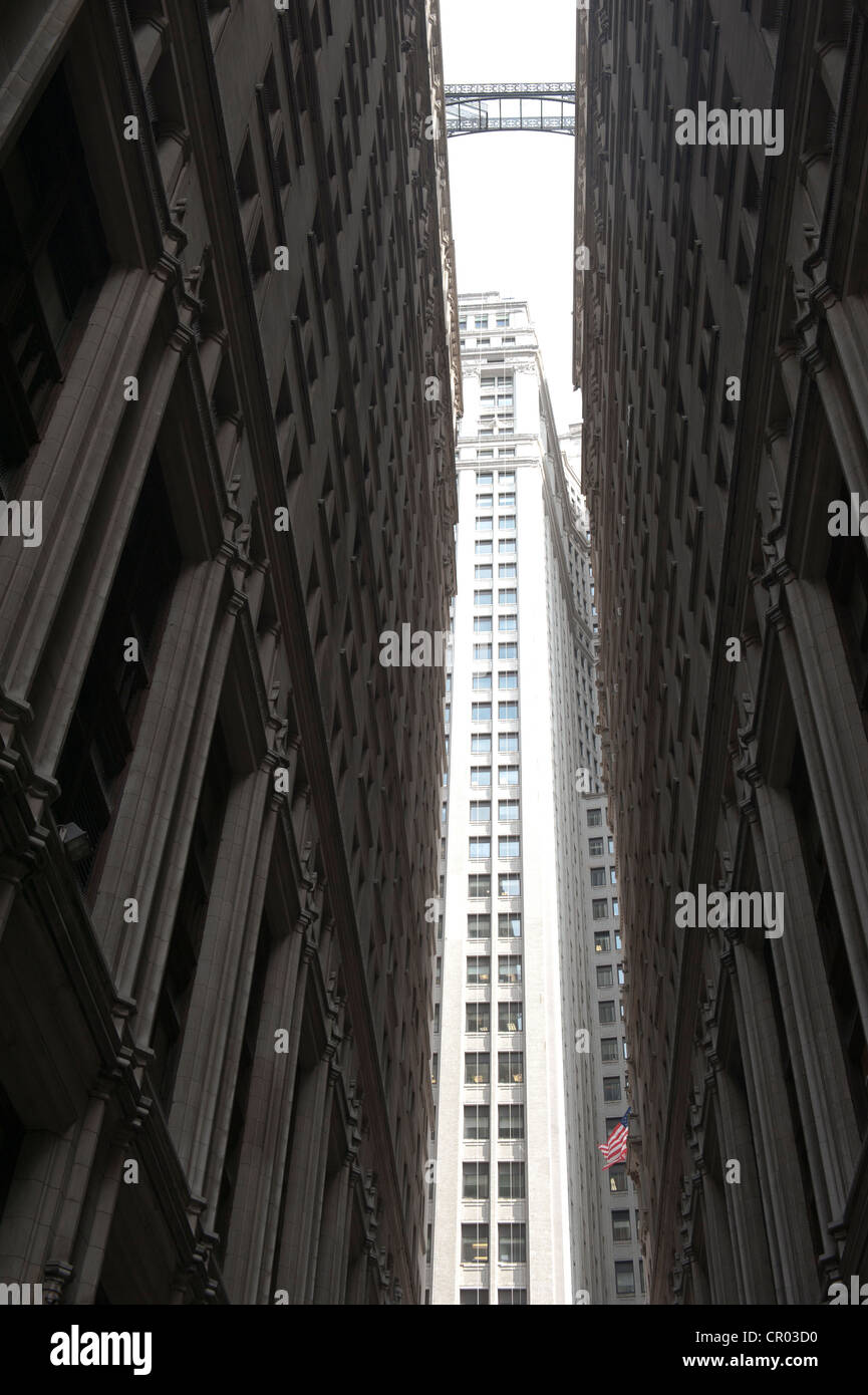 Narrow passage between high-rise buildings close to each other from a worm's-eye view, Financial District, Manhattan Stock Photo
