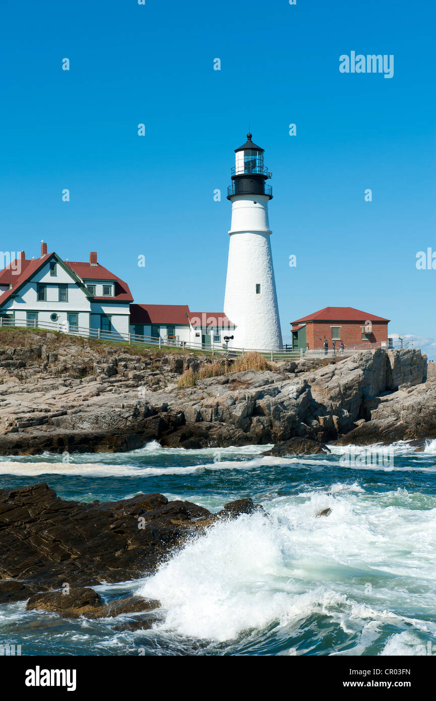 Lighthouse, waves breaking on rocks, Portland Head Light, Cape Elizabeth, Portland, Maine, New England, USA, North America Stock Photo