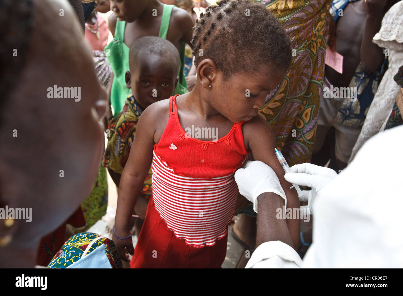 A girl gets vaccinated during a national measles vaccination campaign at the Panzarani health center in the village of Panzarani Stock Photo