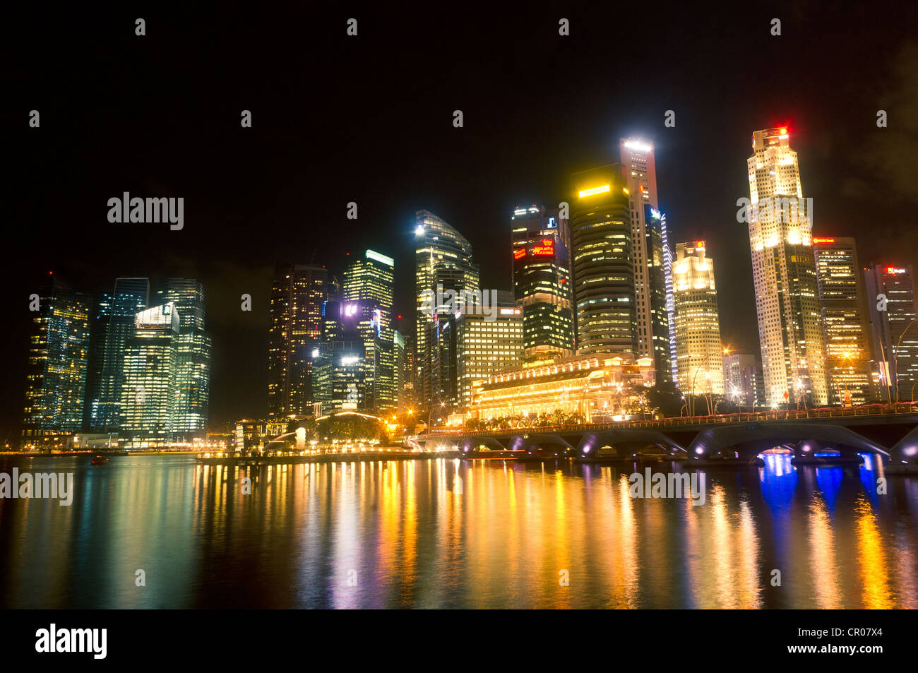 Singapore city skyline at night, overlooking over the waterfront of Marina Bay. Stock Photo