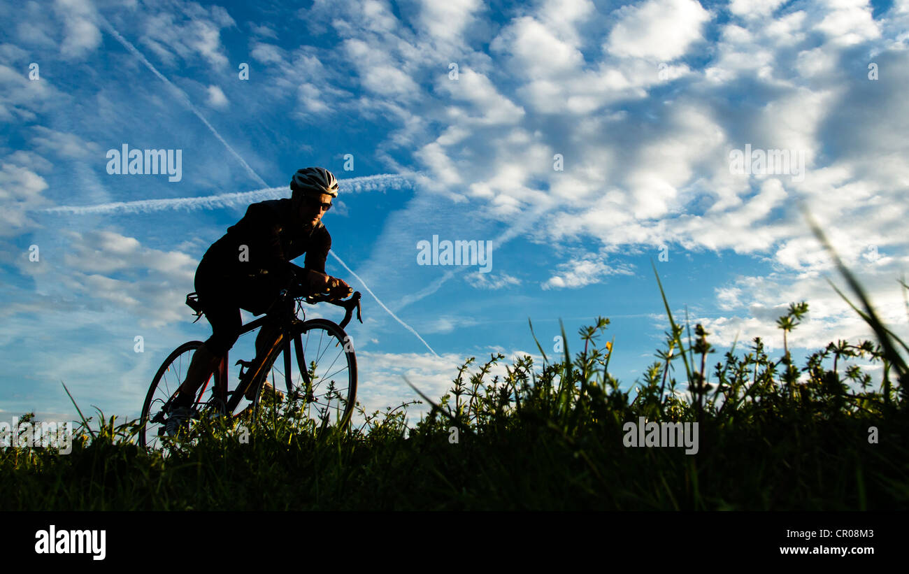 silhouette of a cyclist Stock Photo