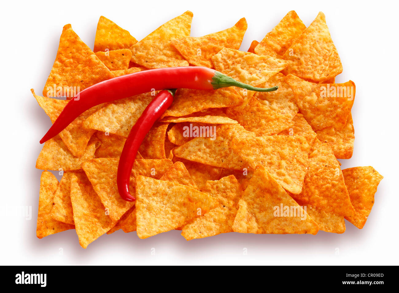 Tortilla chips with two chili peppers Stock Photo Alamy