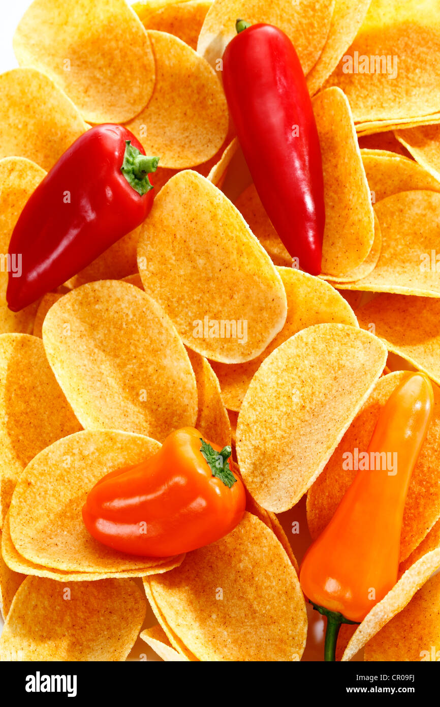Oval paprika potato chips, stacking chips, with sweet peppers, full