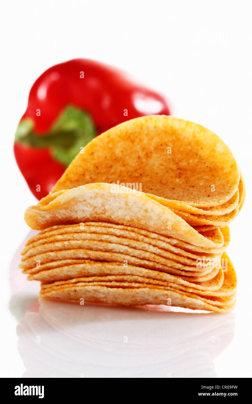 Oval paprika potato chips, stacking chips, stacked in front of a