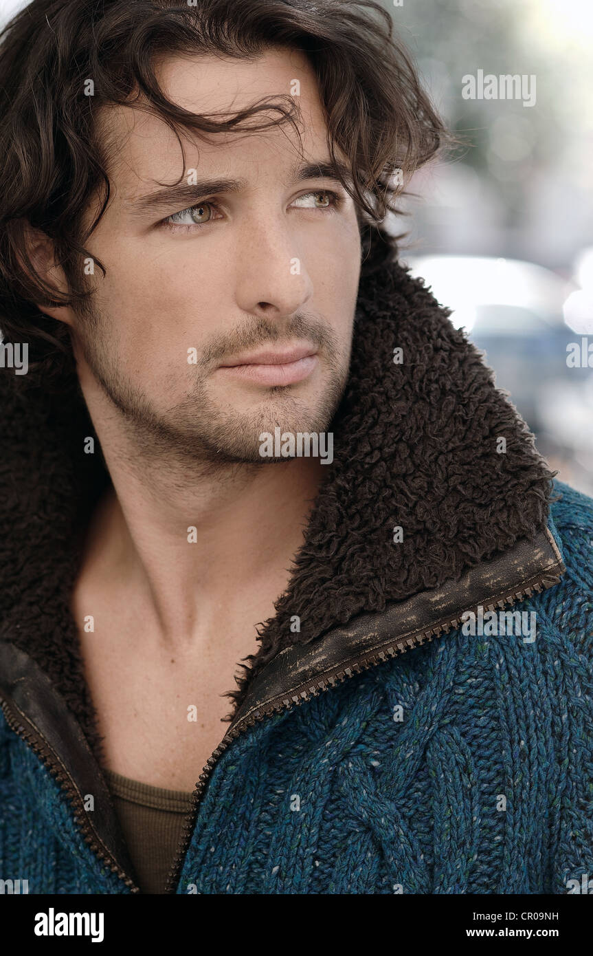 Portrait Of A Dark Haired Long Haired Man In His Early Thirties